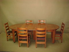 Shown with set of Gustav Stickley dining chairs original to the table.